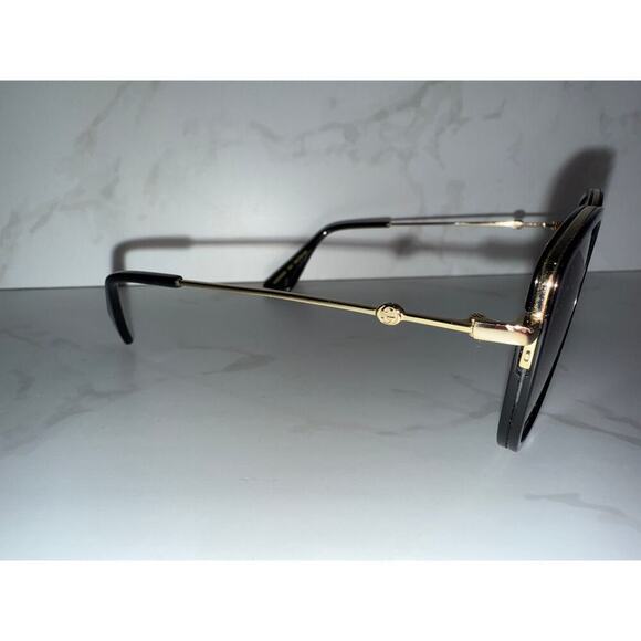 Gucci Cat-Eye Sunglasses in Black with Gold Trim - Vintage main image 6